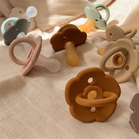 farfetch baby pacifiers